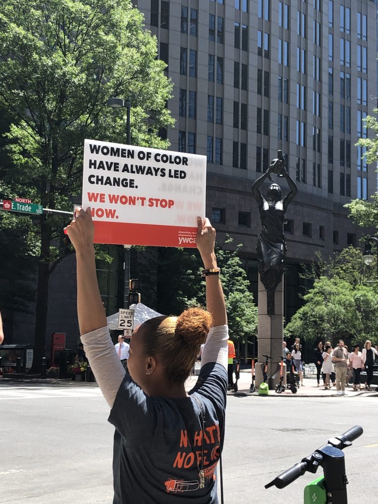 Participant holding sign at YWCA's SAR 2019