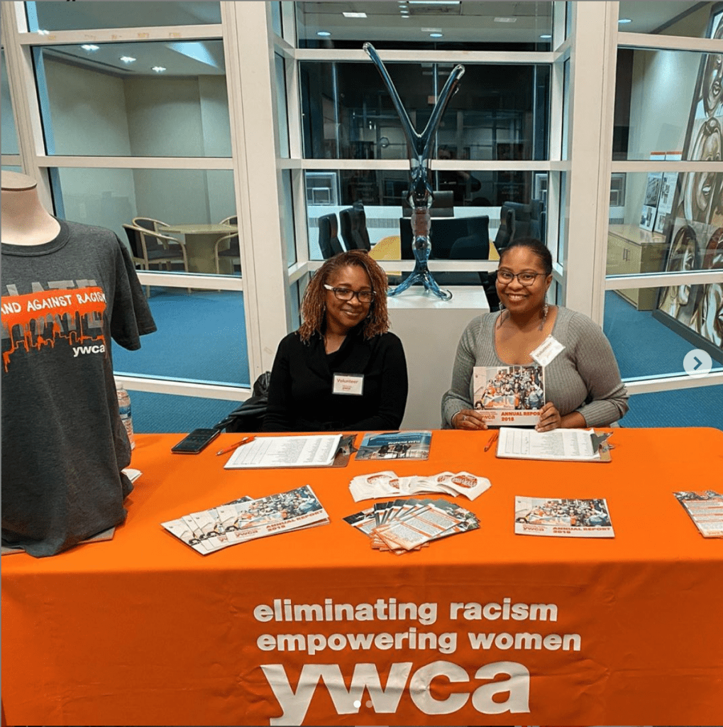 volunteers at check in table