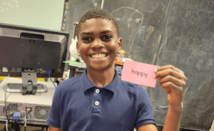 student, smiling, happy, YWCA. Youth Learning Center