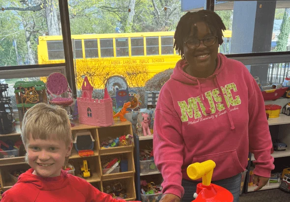 Children in YWCA Central Carolinas childcare facility while parents work out Charlotte NC