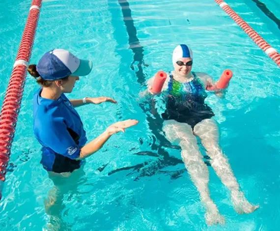 Adult lap swimming in YWCA Central Carolinas indoor pool Charlotte NC
