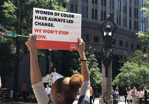 Square Corner SAR Participant holding sign at YWCA's SAR 2019